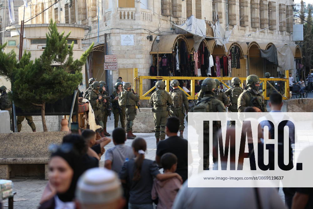 Jewish Settlers Enter Hebron s Old City Under Israeli Army Protection Jewish settlers enter the Old City of Hebron in the West Bank under the protection of Israeli army forces, on October 10, 2026. Photo by Mamoun Wazwaz apaimages Hebron West Bank Palestinian Territory 101026_Hebron_MW_00(1)
