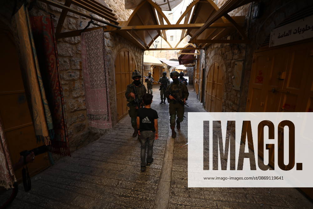 Jewish Settlers Enter Hebron s Old City Under Israeli Army Protection Jewish settlers enter the Old City of Hebron in the West Bank under the protection of Israeli army forces, on October 10, 2026. Photo by Mamoun Wazwaz apaimages Hebron West Bank Palestinian Territory 101026_Hebron_MW_00(11)