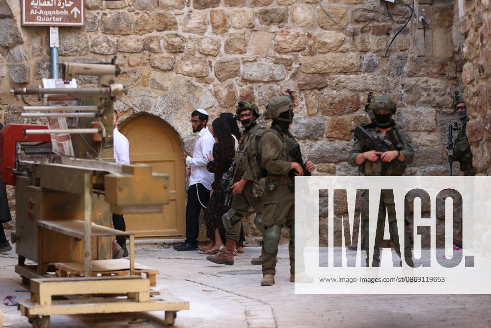 Jewish Settlers Enter Hebron s Old City Under Israeli Army Protection Jewish settlers enter the Old City of Hebron in the West Bank under the protection of Israeli army forces, on October 10, 2026. Photo by Mamoun Wazwaz apaimages Hebron West Bank Palestinian Territory 101026_Hebron_MW_00(20)