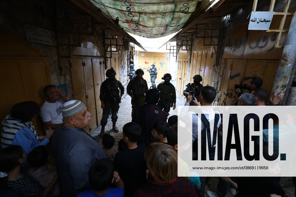 Jewish Settlers Enter Hebron s Old City Under Israeli Army Protection Jewish settlers enter the Old City of Hebron in the West Bank under the protection of Israeli army forces, on October 10, 2026. Photo by Mamoun Wazwaz apaimages Hebron West Bank Palestinian Territory 101026_Hebron_MW_00(25)