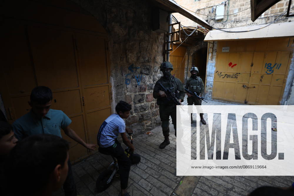 Jewish Settlers Enter Hebron s Old City Under Israeli Army Protection Jewish settlers enter the Old City of Hebron in the West Bank under the protection of Israeli army forces, on October 10, 2026. Photo by Mamoun Wazwaz apaimages Hebron West Bank Palestinian Territory 101026_Hebron_MW_00(30)