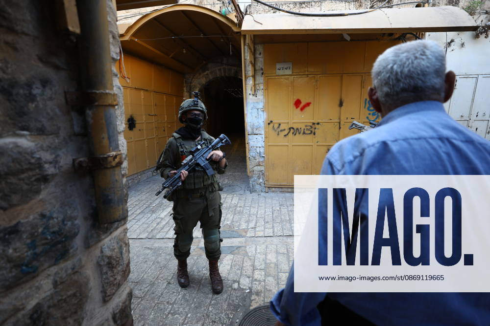 Jewish Settlers Enter Hebron s Old City Under Israeli Army Protection Jewish settlers enter the Old City of Hebron in the West Bank under the protection of Israeli army forces, on October 10, 2026. Photo by Mamoun Wazwaz apaimages Hebron West Bank Palestinian Territory 101026_Hebron_MW_00(31)