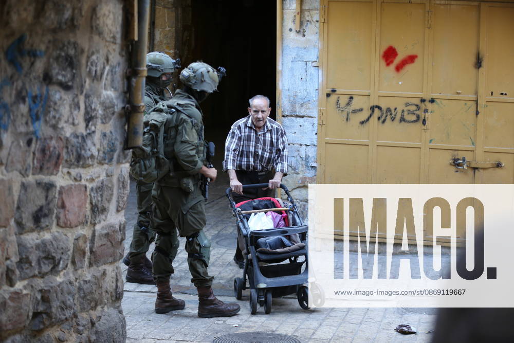 Jewish Settlers Enter Hebron s Old City Under Israeli Army Protection Jewish settlers enter the Old City of Hebron in the West Bank under the protection of Israeli army forces, on October 10, 2026. Photo by Mamoun Wazwaz apaimages Hebron West Bank Palestinian Territory 101026_Hebron_MW_00(33)