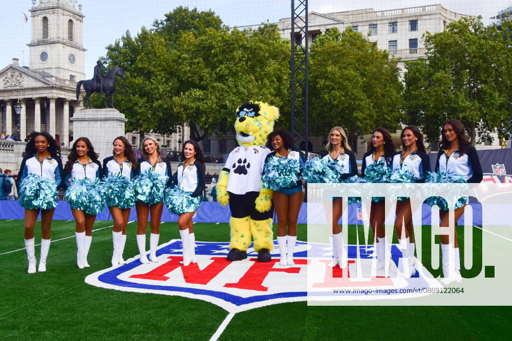 Cheerleaders pose with a mascot at the NFL Experience in Trafalgar Square, a two-day fan event celebrating the 2026 NFL London Games. London United Kingdom - ZUMAv130 20261010_zip_v130_049