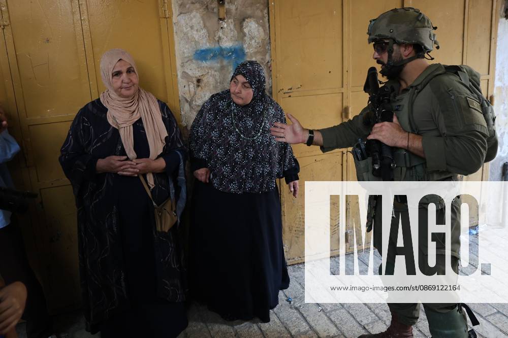 Israeli settlers enter Hebron Old City under military protection HEBRON, OCCUPIED WEST BANK, OCTOBER 10, 2026: Israeli settlers enter Hebron s Old City under the protection of Israeli forces during an organized visit to the area. Israeli soldiers deployed along streets and around the group as settlers moved through the Old City, where Israeli settlers and Palestinian residents live in close proximity amid longstanding tensions and movement restrictions. HEBRON Palestine, State of