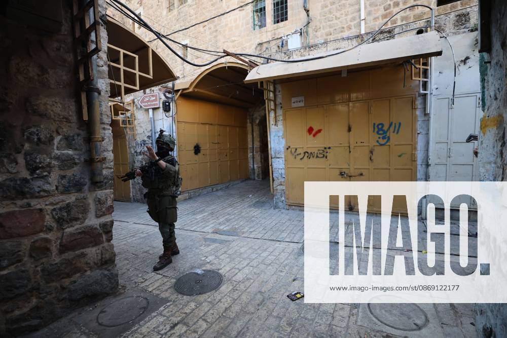 Israeli settlers enter Hebron Old City under military protection HEBRON, OCCUPIED WEST BANK, OCTOBER 10, 2026: Israeli settlers enter Hebron s Old City under the protection of Israeli forces during an organized visit to the area. Israeli soldiers deployed along streets and around the group as settlers moved through the Old City, where Israeli settlers and Palestinian residents live in close proximity amid longstanding tensions and movement restrictions. HEBRON Palestine, State of