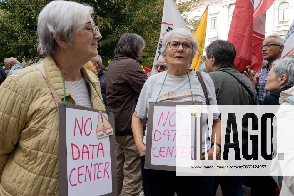 MILAN, ITALY Ã¢â‚¬ OCTOBER 10, 2026: Protesters gather for a sit-in in Piazza della Scala in central Milan to oppose the development of new data centers across Lombardy and Italy. The demonstration is organized by the Rete dei Comitati No Data Center (No Data Center Committee Network), which is calling for a moratorium on permits for new facilities. The group also urges public authorities to conduct thorough environmental, urban planning and regional assessments before approving projects. For approved facilities that have not yet begun operating, campaigners are calling for reviews to be reopened if potential microclimate effects and cumulative impacts with existing facilities were not adequately assessed. - ZUMAq101 20261007_zna_q101_448