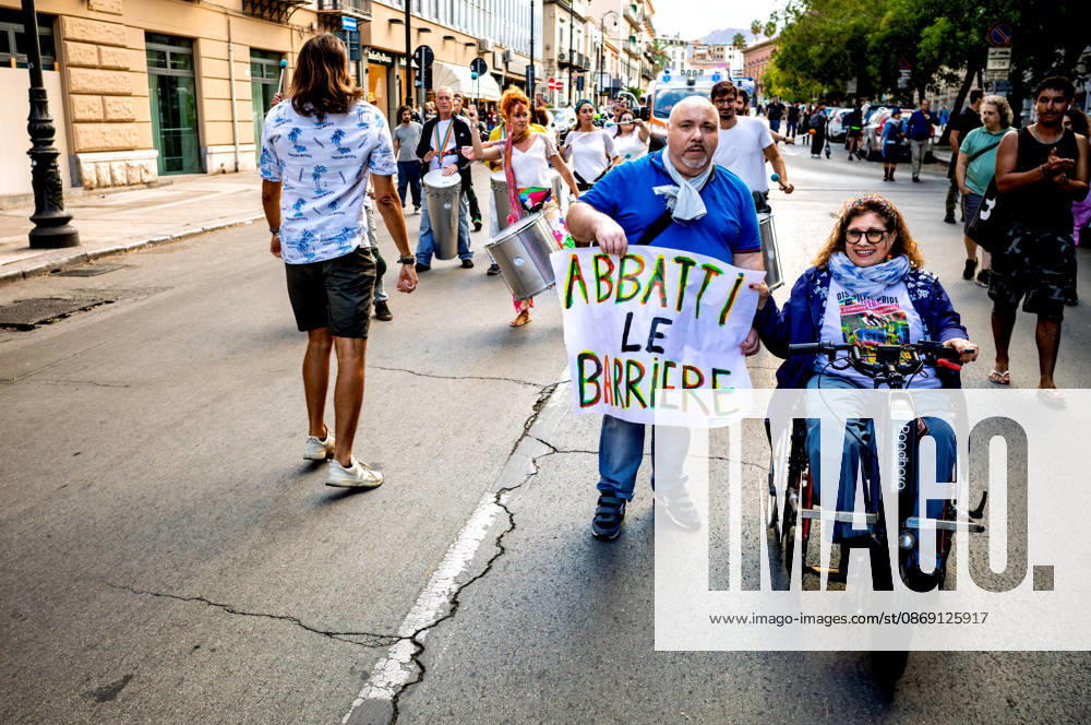 Disability Pride Palermo 2026 PALERMO, ITALY - OCTOBER 10: Disability Pride Palermo, dedicated this year to the theme Revolutionary Disabilities to advocate for the rights and self-determination of people with disabilities and to demand the elimination of architectural barriers, sign that read: Break down the barriers, on October 10, 2026 in Palermo, Italy. Palermo Sicily Italy