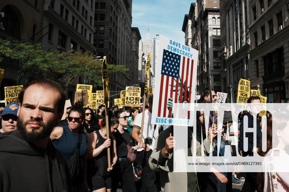 Protesters march through lower Manhattan during an anti-ICE protest on October 10, 2026 in New York City. Protesters take to the streets following an incident where ICE agents shot a 28-year-old-man, Oscar Belgal while he in a vehicle with his 5-year old child in the Marble Hill neighborhood in the Bronx. New York USA - ZUMAb148 20261010_zap_b148_041