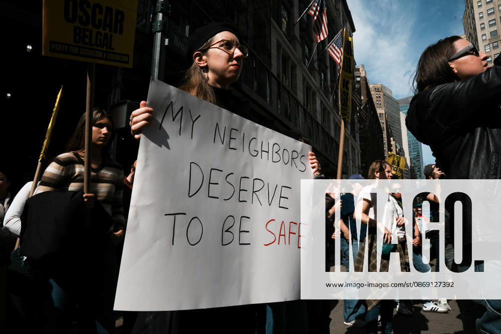 Protesters at an anti-ICE protest in Herald Square on October 10, 2026 in New York City. Protesters take to the streets following an incident where ICE agents shot a 28-year-old-man, Oscar Belgal while he in a vehicle with his 5-year old child in the Marble Hill neighborhood in the Bronx. New York USA - ZUMAb148 20261010_zap_b148_047