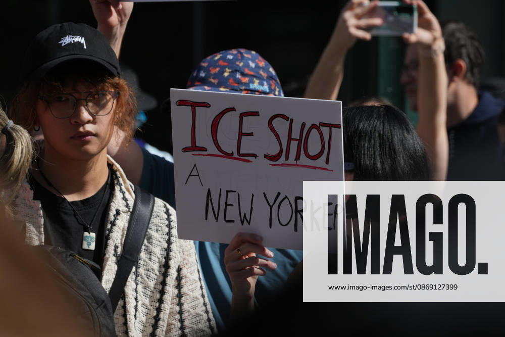 Protesters at an anti-ICE protest in Herald Square on October 10, 2026 in New York City. Protesters take to the streets following an incident where ICE agents shot a 28-year-old-man, Oscar Belgal while he in a vehicle with his 5-year old child in the Marble Hill neighborhood in the Bronx. New York USA - ZUMAb148 20261010_zap_b148_052