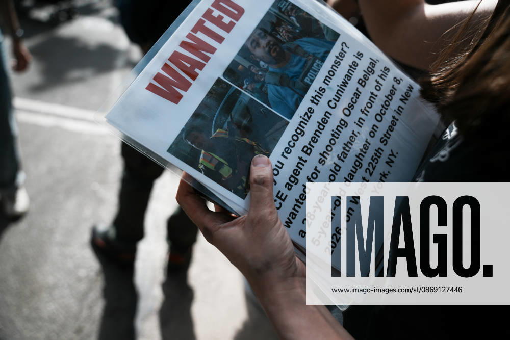 A protester holds a Wanted Sign with ICE Agent Brendan Cuni , accused of shooting Oscar Belgal, on a sign at an anti-ICE protest near Union Square on October 10, 2026 in New York City. Protesters take to the streets following an incident where ICE agents shot a 28-year-old-man, Oscar Belgal while he in a vehicle with his 5-year old child in the Marble Hill neighborhood in the Bronx. New York USA - ZUMAb148 20261010_zap_b148_063