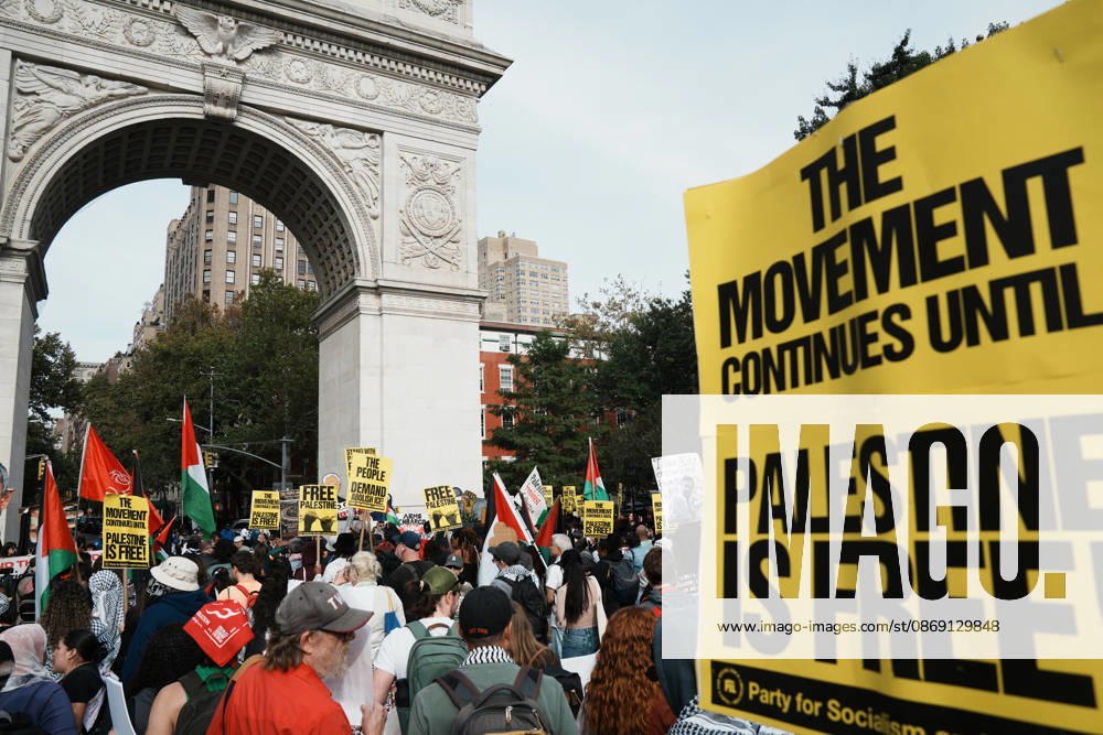 A protester holds up a sign as hundreds of people attend a Pro-Palestine rally in Washington Square Park on October 10, 2026 in New York. New York USA - ZUMAb148 20261010_zap_b148_089