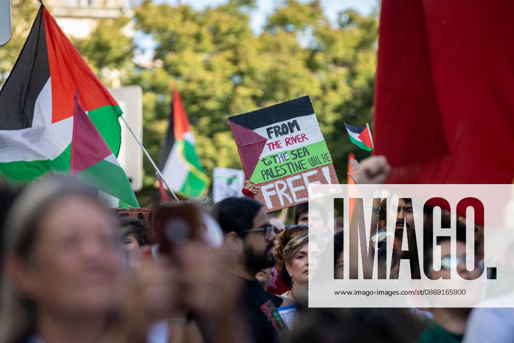 Participants carry Palestinian flags during a Palestine solidarity march through the streets of Porto. Hundreds of demonstrators gathered in Porto for a Palestine solidarity march calling for an end to the war in Gaza and support for Palestinian rights. The march began at Praca dos Poveiros and concluded at Praca D. Joao I. Porto Portugal - ZUMAs197 20261010_aaa_s197_438