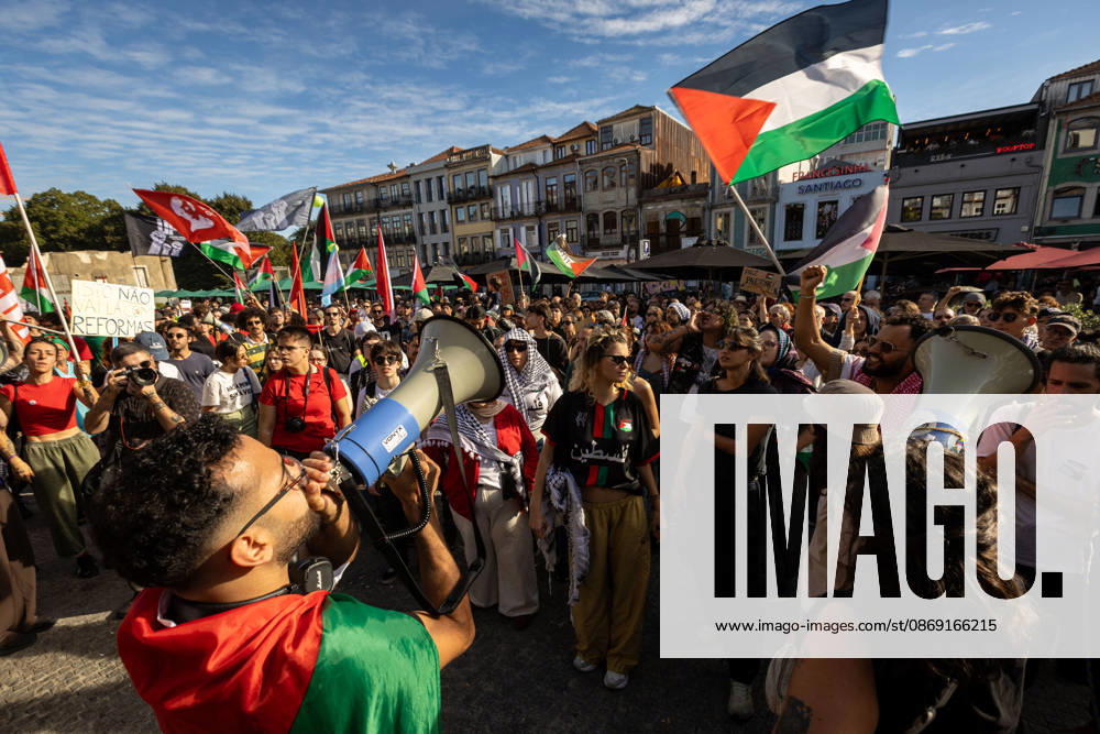 Participants carrying Palestinian flags and placards gather at Praca dos Poveiros at the beginning of a Palestine solidarity march. Hundreds of demonstrators gathered in Porto for a Palestine solidarity march calling for an end to the war in Gaza and support for Palestinian rights. The march began at Praca dos Poveiros and concluded at Praca D. Joao I. Porto Portugal - ZUMAs197 20261010_aaa_s197_444