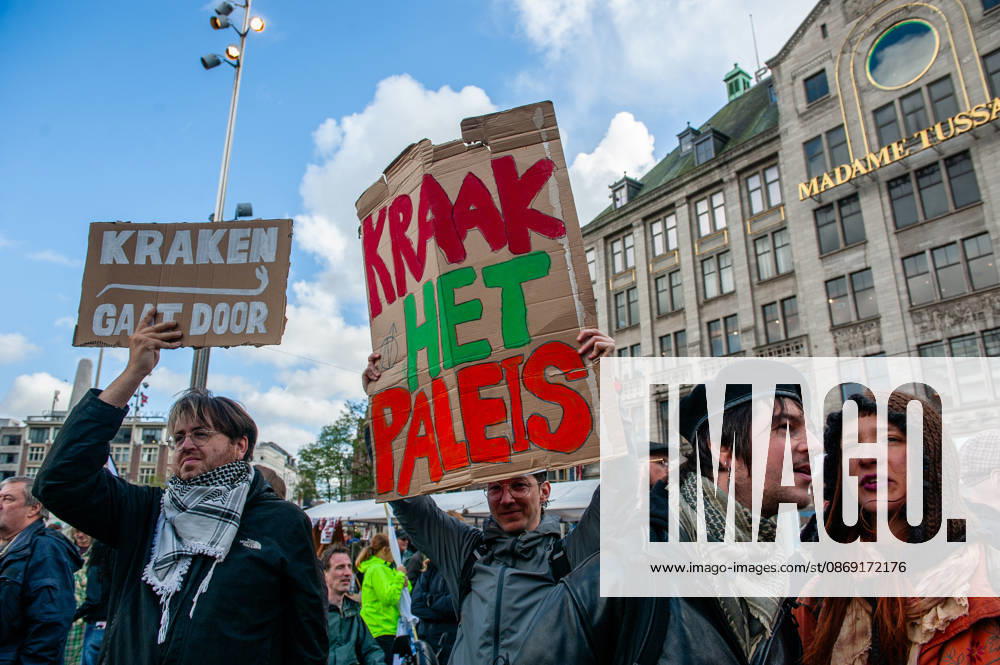 Protesters are holding placards asking to squat the Royal Palace during the demonstration. People gathered against the worsening housing crisis. Under the motto Houses for people, not for profit, they demand fundamental changes in Dutch public housing. Amsterdam Netherlands - ZUMAs197 20261010_aaa_s197_549