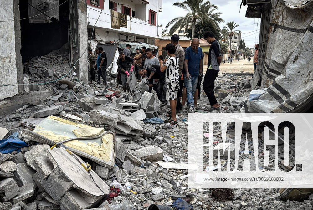 Palestinians Inspect Damage After Strike in Deir al-Balah Palestinians inspect their belongings amid the rubble of damaged residential buildings and their displacement tents after an Israeli airstrike targeted a house in Deir al-Balah, in the central Gaza Strip, on October 11, 2026. Photo by Ahmed Ibrahim apaimages Deir al-Balah Gaza Palestinian Territory 111026_Deir_al-Balah_AI_00(17)