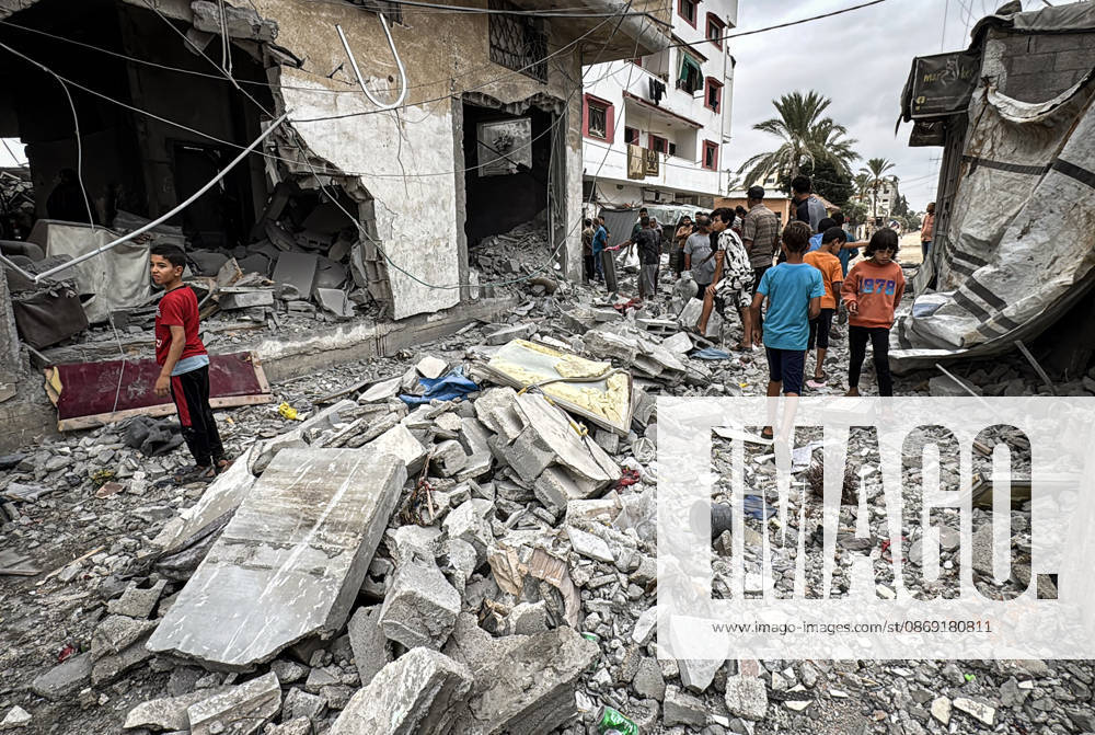 Palestinians Inspect Damage After Strike in Deir al-Balah Palestinians inspect their belongings amid the rubble of damaged residential buildings and their displacement tents after an Israeli airstrike targeted a house in Deir al-Balah, in the central Gaza Strip, on October 11, 2026. Photo by Ahmed Ibrahim apaimages Deir al-Balah Gaza Palestinian Territory 111026_Deir_al-Balah_AI_00(18)