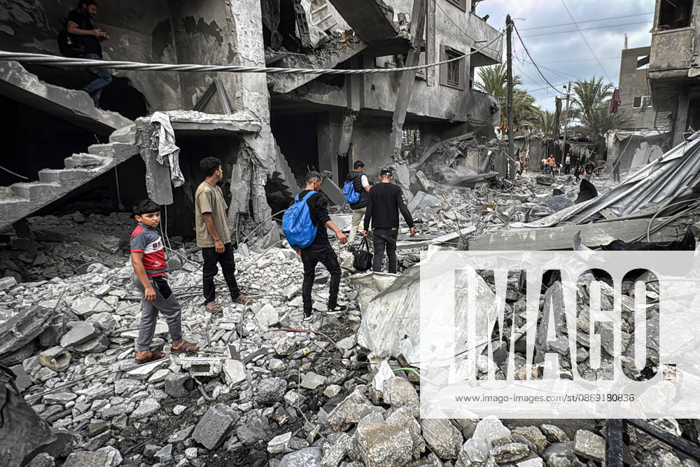Palestinians Inspect Damage After Strike in Deir al-Balah Palestinians inspect their belongings amid the rubble of damaged residential buildings and their displacement tents after an Israeli airstrike targeted a house in Deir al-Balah, in the central Gaza Strip, on October 11, 2026. Photo by Ahmed Ibrahim apaimages Deir al-Balah Gaza Palestinian Territory 111026_Deir_al-Balah_AI_00(20)