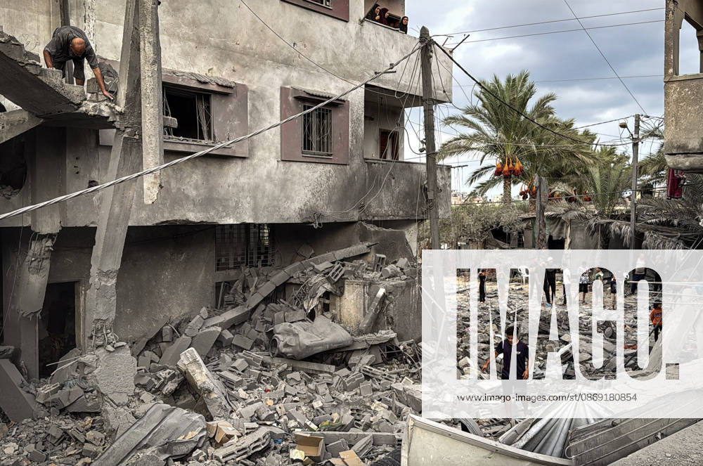 Palestinians Inspect Damage After Strike in Deir al-Balah Palestinians inspect their belongings amid the rubble of damaged residential buildings and their displacement tents after an Israeli airstrike targeted a house in Deir al-Balah, in the central Gaza Strip, on October 11, 2026. Photo by Ahmed Ibrahim apaimages Deir al-Balah Gaza Palestinian Territory 111026_Deir_al-Balah_AI_00(22)