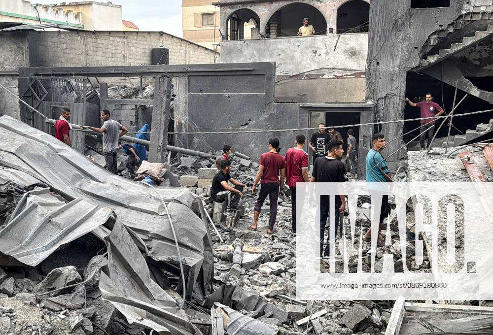 Palestinians Inspect Damage After Strike in Deir al-Balah Palestinians inspect their belongings amid the rubble of damaged residential buildings and their displacement tents after an Israeli airstrike targeted a house in Deir al-Balah, in the central Gaza Strip, on October 11, 2026. Photo by Ahmed Ibrahim apaimages Deir al-Balah Gaza Palestinian Territory 111026_Deir_al-Balah_AI_00(23)