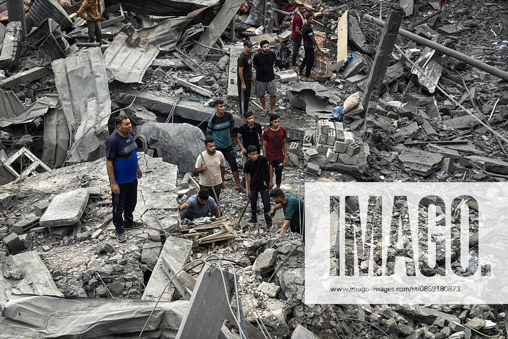 Palestinians Inspect Damage After Strike in Deir al-Balah Palestinians inspect their belongings amid the rubble of damaged residential buildings and their displacement tents after an Israeli airstrike targeted a house in Deir al-Balah, in the central Gaza Strip, on October 11, 2026. Photo by Ahmed Ibrahim apaimages Deir al-Balah Gaza Palestinian Territory 111026_Deir_al-Balah_AI_00(3)