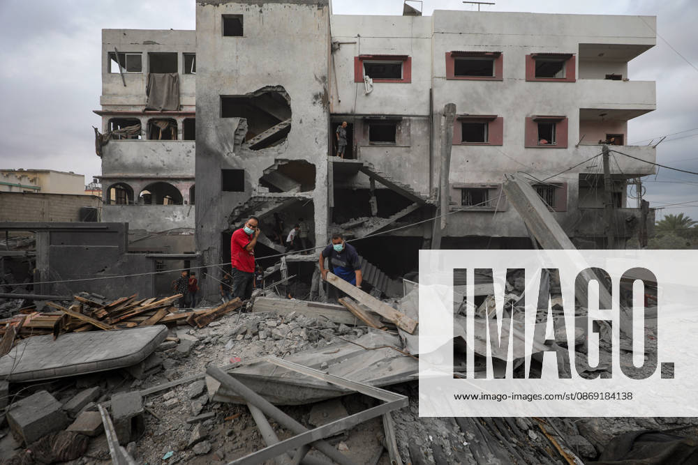 Palestinians Inspect Damage After Strike in Al-Zawayda Palestinians inspect their belongings amid the rubble of damaged residential buildings after an Israeli airstrike targeted a residential block in Al-Zawayda, in the central Gaza Strip, on October 11, 2026. Photo by Moiz Salhi apaimages Nusairat Gaza Strip Palestinian Territory 111026_Al-Zawayda_MS_00(29)