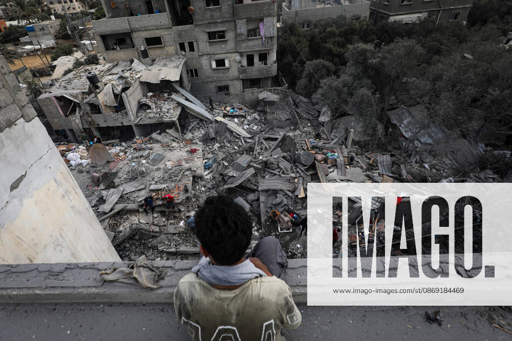 Palestinians Inspect Damage After Strike in Al-Zawayda Palestinians inspect their belongings amid the rubble of damaged residential buildings after an Israeli airstrike targeted a residential block in Al-Zawayda, in the central Gaza Strip, on October 11, 2026. Photo by Moiz Salhi apaimages Nusairat Gaza Strip Palestinian Territory 111026_Al-Zawayda_MS_00(17)