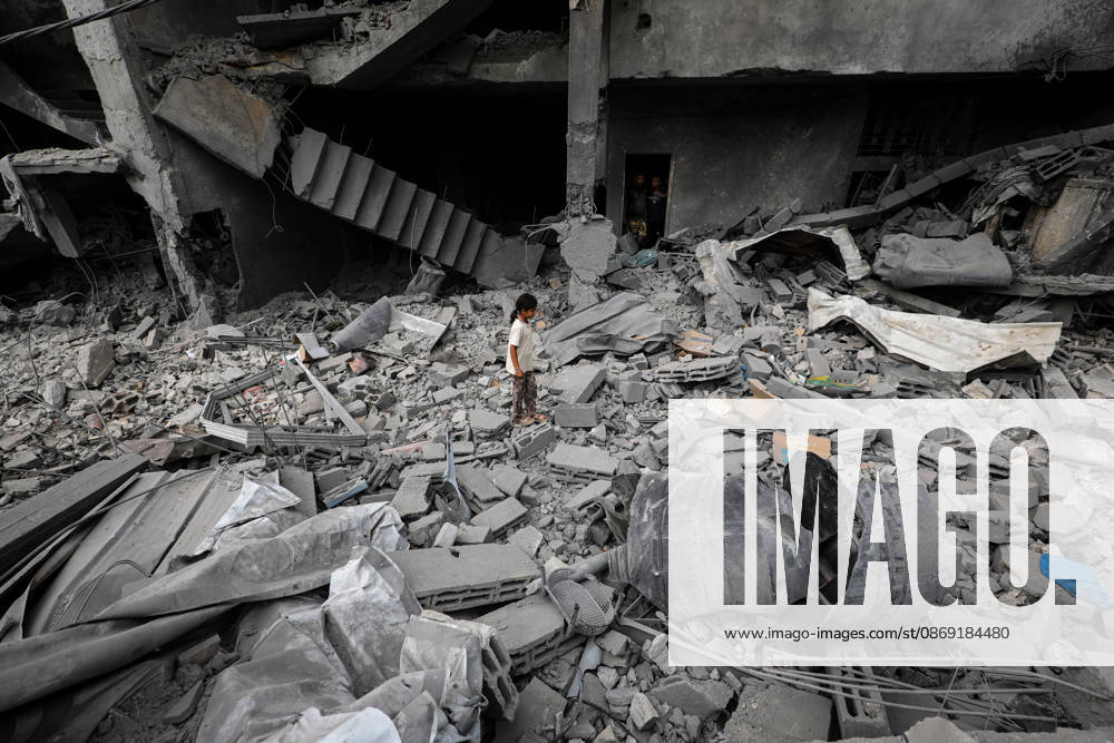 Palestinians Inspect Damage After Strike in Al-Zawayda Palestinians inspect their belongings amid the rubble of damaged residential buildings after an Israeli airstrike targeted a residential block in Al-Zawayda, in the central Gaza Strip, on October 11, 2026. Photo by Moiz Salhi apaimages Nusairat Gaza Strip Palestinian Territory 111026_Al-Zawayda_MS_00(25)