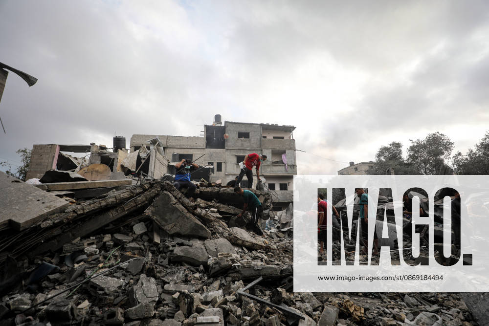 Palestinians Inspect Damage After Strike in Al-Zawayda Palestinians inspect their belongings amid the rubble of damaged residential buildings after an Israeli airstrike targeted a residential block in Al-Zawayda, in the central Gaza Strip, on October 11, 2026. Photo by Moiz Salhi apaimages Nusairat Gaza Strip Palestinian Territory 111026_Al-Zawayda_MS_00(4)
