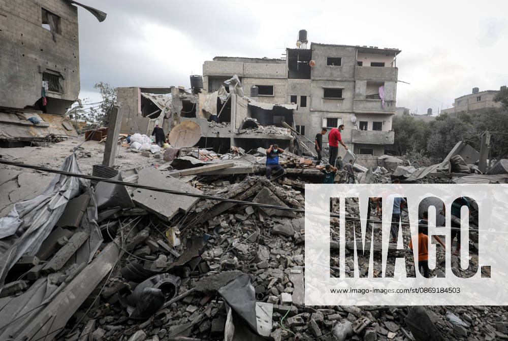 Palestinians Inspect Damage After Strike in Al-Zawayda Palestinians inspect their belongings amid the rubble of damaged residential buildings after an Israeli airstrike targeted a residential block in Al-Zawayda, in the central Gaza Strip, on October 11, 2026. Photo by Moiz Salhi apaimages Nusairat Gaza Strip Palestinian Territory 111026_Al-Zawayda_MS_00(5)