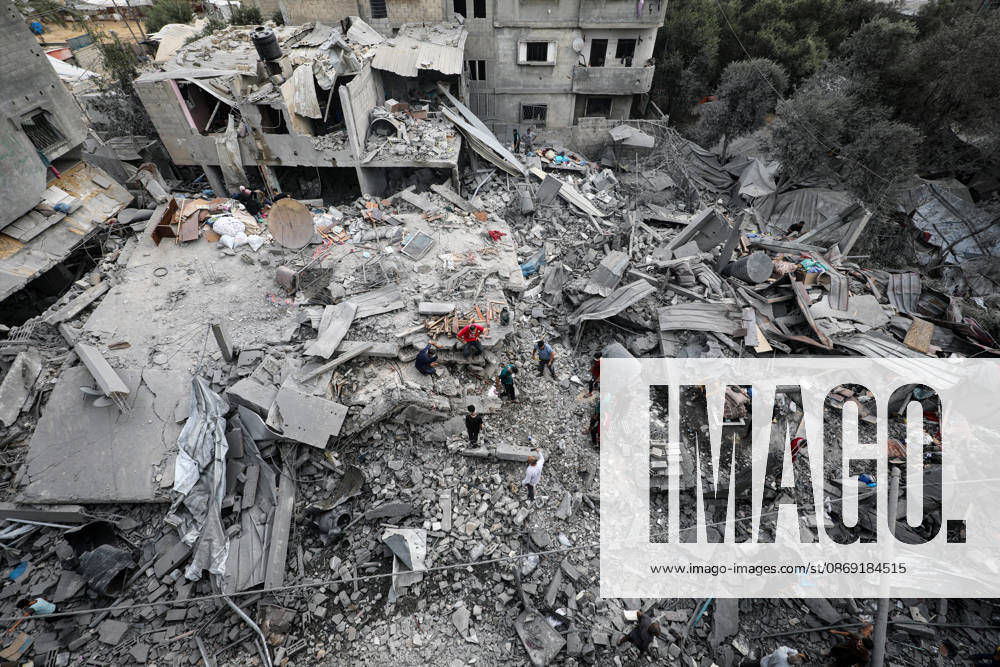 Palestinians Inspect Damage After Strike in Al-Zawayda Palestinians inspect their belongings amid the rubble of damaged residential buildings after an Israeli airstrike targeted a residential block in Al-Zawayda, in the central Gaza Strip, on October 11, 2026. Photo by Moiz Salhi apaimages Nusairat Gaza Strip Palestinian Territory 111026_Al-Zawayda_MS_00(13)