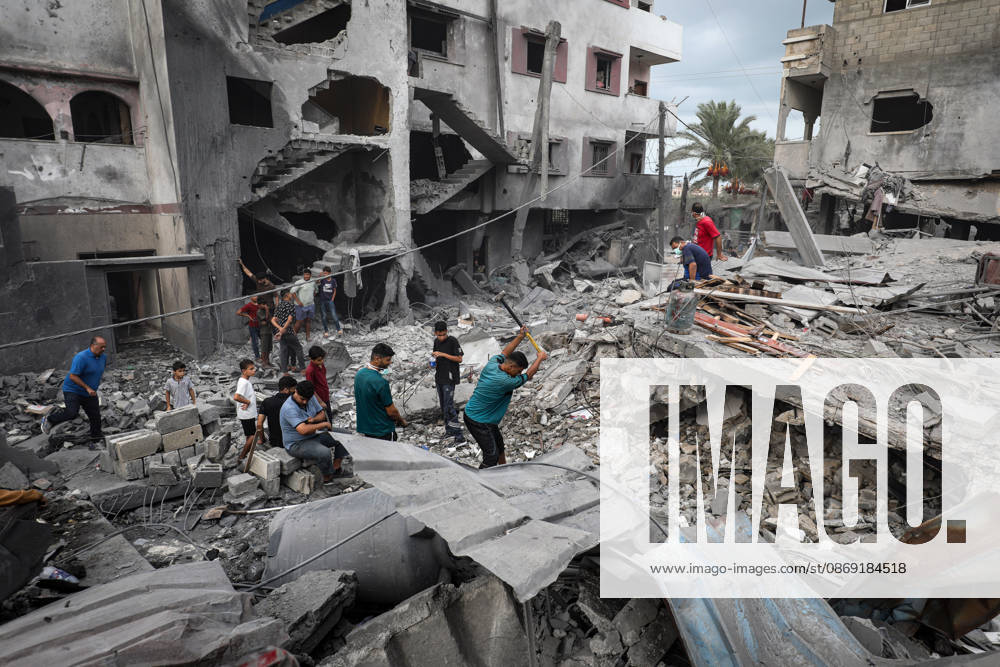 Palestinians Inspect Damage After Strike in Al-Zawayda Palestinians inspect their belongings amid the rubble of damaged residential buildings after an Israeli airstrike targeted a residential block in Al-Zawayda, in the central Gaza Strip, on October 11, 2026. Photo by Moiz Salhi apaimages Nusairat Gaza Strip Palestinian Territory 111026_Al-Zawayda_MS_00(32)