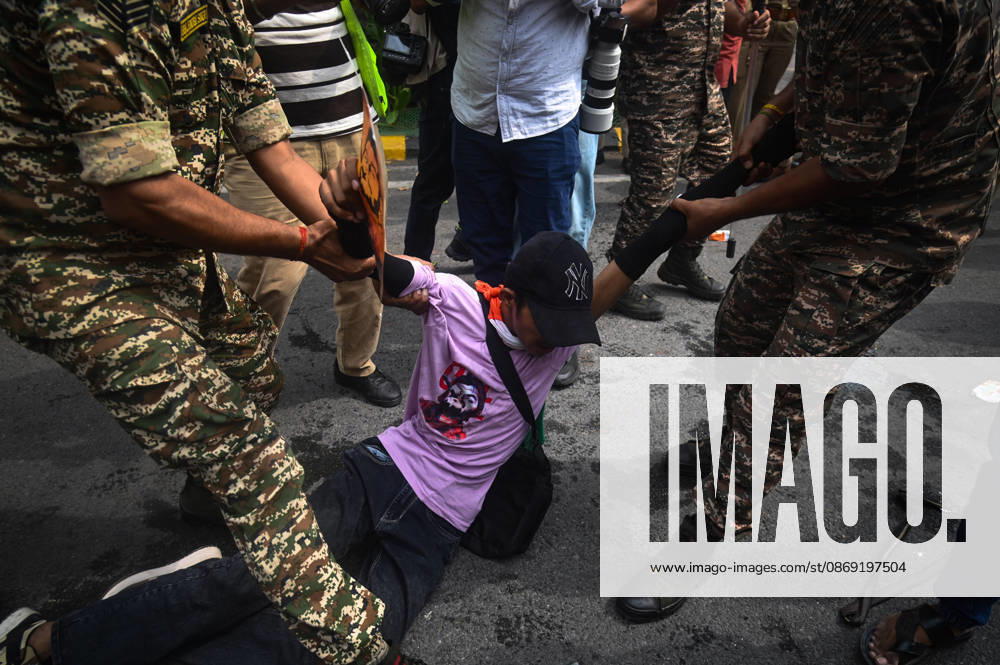 Security personnel detain a protestor during a protest seeking the resignation of India s Chief Election Commissioner Gyanesh Kumar, over alleged electoral malpractices in the Special Intensive Revision (SIR) of electoral rolls, in New Delhi, India on October 11, 2026. New Delhi India - ZUMAj168 20261011_zip_j168_016