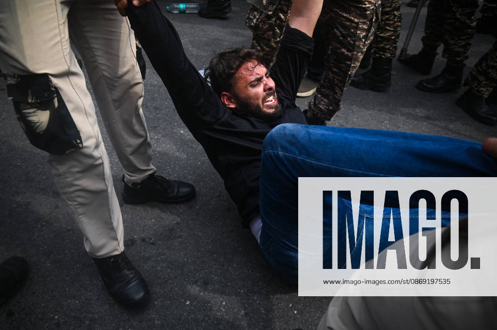 Security personnel detain a protestor during a protest seeking the resignation of India s Chief Election Commissioner Gyanesh Kumar, over alleged electoral malpractices in the Special Intensive Revision (SIR) of electoral rolls, in New Delhi, India on October 11, 2026. New Delhi India - ZUMAj168 20261011_zip_j168_017