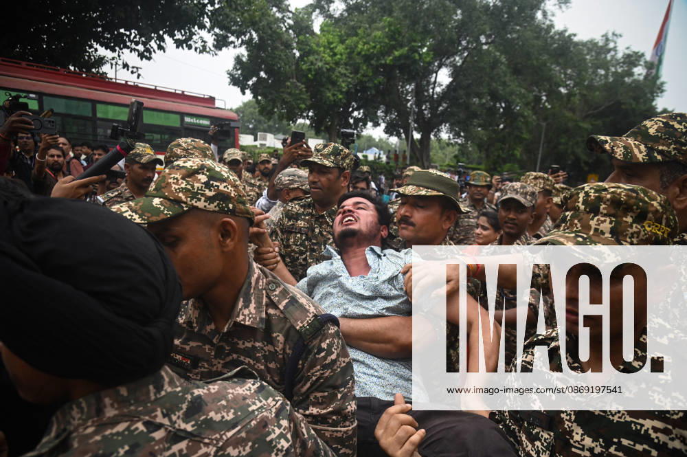 Security personnel detain a protestor during a protest seeking the resignation of India s Chief Election Commissioner Gyanesh Kumar, over alleged electoral malpractices in the Special Intensive Revision (SIR) of electoral rolls, in New Delhi, India on October 11, 2026. New Delhi India - ZUMAj168 20261011_zip_j168_020