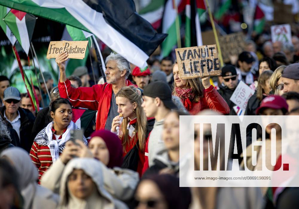 AMSTERDAM - Demonstrators during a national protest on Dam Square marking the conclusion of the nationwide week of action for sanctions against Israel. According to various activist groups, despite the ceasefire , the genocide against the Palestinian people continues unabated. KOEN VAN WEEL ANP netherlands out - belgium out