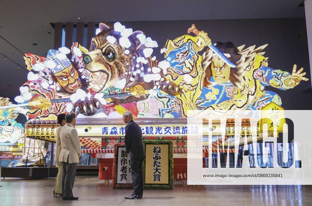 Emperor views Nebuta Festival float Japan s Emperor Naruhito (L) and Empress Masako look at a decorated float that was used at the Aomori Nebuta Festival in August, during a visit to a sightseeing facility in the northeastern Japan city on Oct. 11, 2026. (Pool photo) A14AA0005630644P