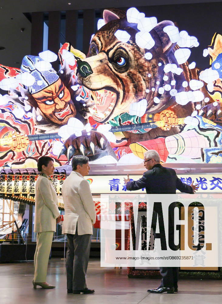 Emperor views Nebuta Festival float Japan s Emperor Naruhito (C) and Empress Masako look at a decorated float that was used at the Aomori Nebuta Festival in August, during a visit to a sightseeing facility in the northeastern Japan city on Oct. 11, 2026. (Pool photo) A14AA0005630642P