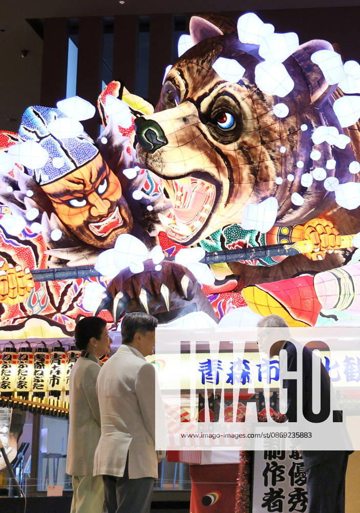 Emperor views Nebuta Festival float Japan s Emperor Naruhito (C) and Empress Masako look at a decorated float that was used at the Aomori Nebuta Festival in August, during a visit to a sightseeing facility in the northeastern Japan city on Oct. 11, 2026. (Pool photo) A14AA0005630643P