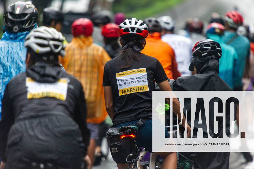 Cyclists Protest US-Led Pax Silica Initiative MANILA, PHILIPPINES - OCTOBER 12, 2026: A bike ride was led by local cyclists, along with environmental advocates, in condemnation of the US-led Pax Silica Initiative that participants say will destroy the livelihoods of local farming communities, displace local indigenous communities, and consume tremendous amounts of water that would have otherwise be utilized by local Filipinos. The route started in the Quezon City Hall and ended in the Bonifacio Shrine where the closing program was held with each sector that participated in the bike ride expressing their message of solidarity to the cause. Multiple stops where held in front of the office of the Department of Environment and Natural Resources