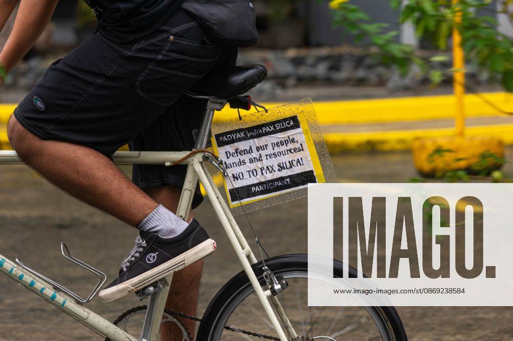 Cyclists Protest US-Led Pax Silica Initiative MANILA, PHILIPPINES - OCTOBER 12, 2026: A bike ride was led by local cyclists, along with environmental advocates, in condemnation of the US-led Pax Silica Initiative that participants say will destroy the livelihoods of local farming communities, displace local indigenous communities, and consume tremendous amounts of water that would have otherwise be utilized by local Filipinos. The route started in the Quezon City Hall and ended in the Bonifacio Shrine where the closing program was held with each sector that participated in the bike ride expressing their message of solidarity to the cause. Multiple stops where held in front of the office of the Department of Environment and Natural Resources