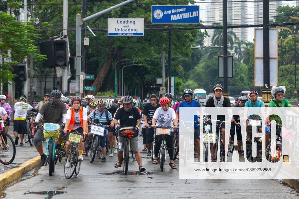 Cyclists Protest US-Led Pax Silica Initiative MANILA, PHILIPPINES - OCTOBER 12, 2026: A bike ride was led by local cyclists, along with environmental advocates, in condemnation of the US-led Pax Silica Initiative that participants say will destroy the livelihoods of local farming communities, displace local indigenous communities, and consume tremendous amounts of water that would have otherwise be utilized by local Filipinos. The route started in the Quezon City Hall and ended in the Bonifacio Shrine where the closing program was held with each sector that participated in the bike ride expressing their message of solidarity to the cause. Multiple stops where held in front of the office of the Department of Environment and Natural Resources