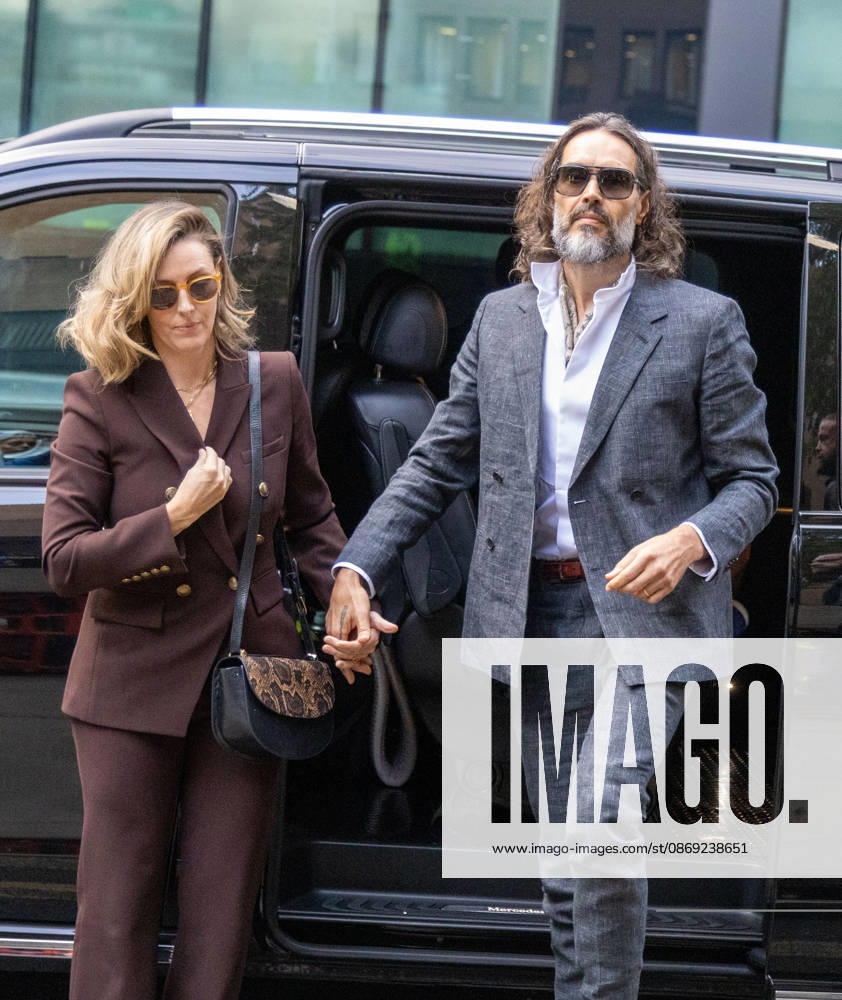 RUSSELL BRAND with his wife LAURA arrives at Southwark Crown Court, where he is facing three charges of rape, indecent assault, and three counts of sexual assault, relating to six women. London United Kingdom - ZUMAs262 20261012_zip_s262_004
