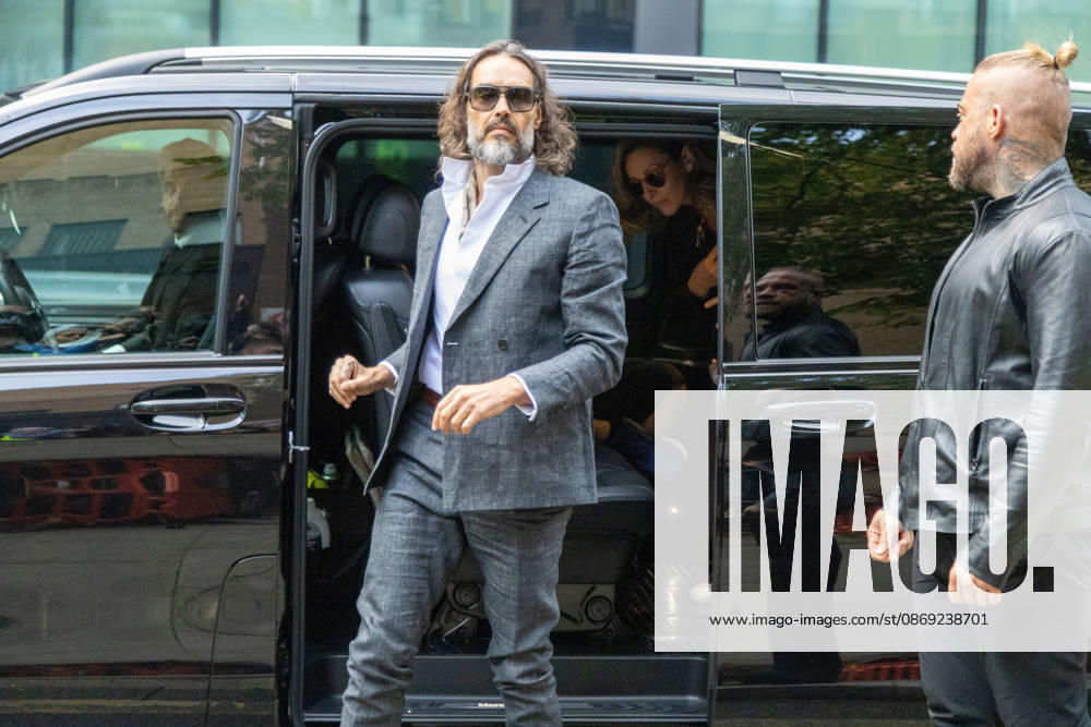 RUSSELL BRAND arrives at Southwark Crown Court, where he is facing three charges of rape, indecent assault, and three counts of sexual assault, relating to six women. London United Kingdom - ZUMAs262 20261012_zip_s262_007