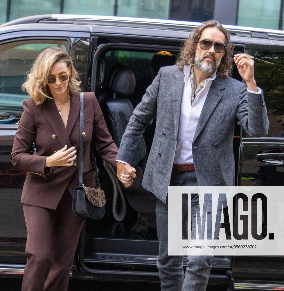RUSSELL BRAND with his wife LAURA arrives at Southwark Crown Court, where he is facing three charges of rape, indecent assault, and three counts of sexual assault, relating to six women. London United Kingdom - ZUMAs262 20261012_zip_s262_008
