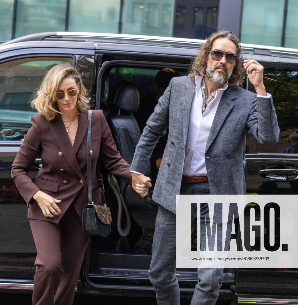 RUSSELL BRAND with his wife LAURA arrives at Southwark Crown Court, where he is facing three charges of rape, indecent assault, and three counts of sexual assault, relating to six women. London United Kingdom - ZUMAs262 20261012_zip_s262_009