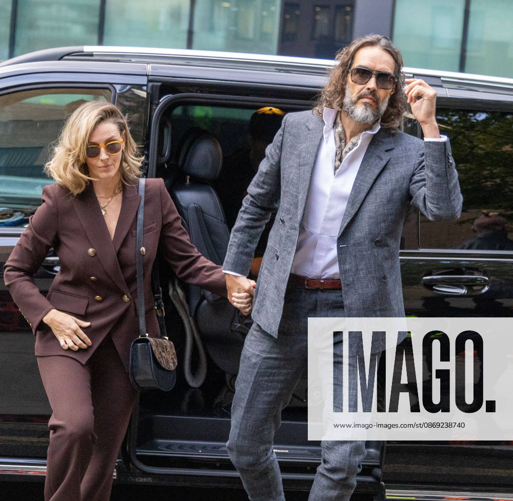 RUSSELL BRAND with his wife LAURA arrives at Southwark Crown Court, where he is facing three charges of rape, indecent assault, and three counts of sexual assault, relating to six women. London United Kingdom - ZUMAs262 20261012_zip_s262_010