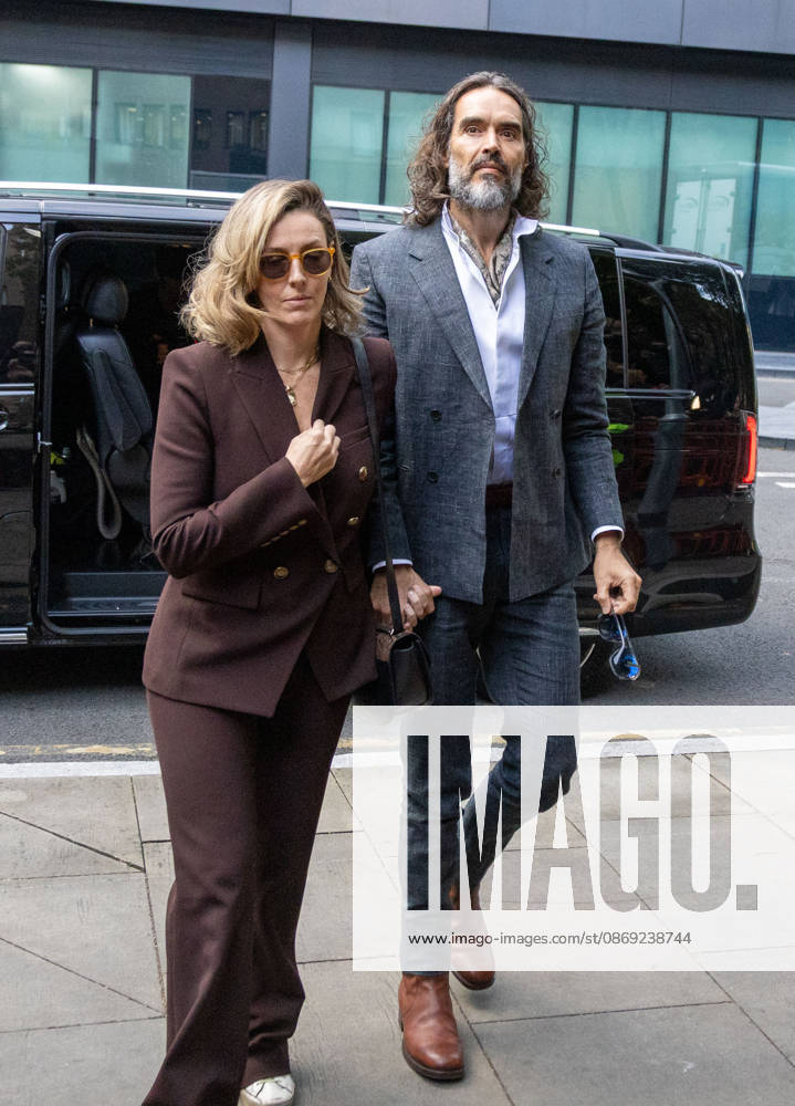 RUSSELL BRAND with his wife LAURA arrives at Southwark Crown Court, where he is facing three charges of rape, indecent assault, and three counts of sexual assault, relating to six women. London United Kingdom - ZUMAs262 20261012_zip_s262_012