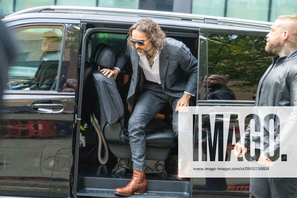 RUSSELL BRAND arrives at Southwark Crown Court, where he is facing three charges of rape, indecent assault, and three counts of sexual assault, relating to six women. London United Kingdom - ZUMAs262 20261012_zip_s262_016